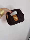 Bolso de mano trenzado