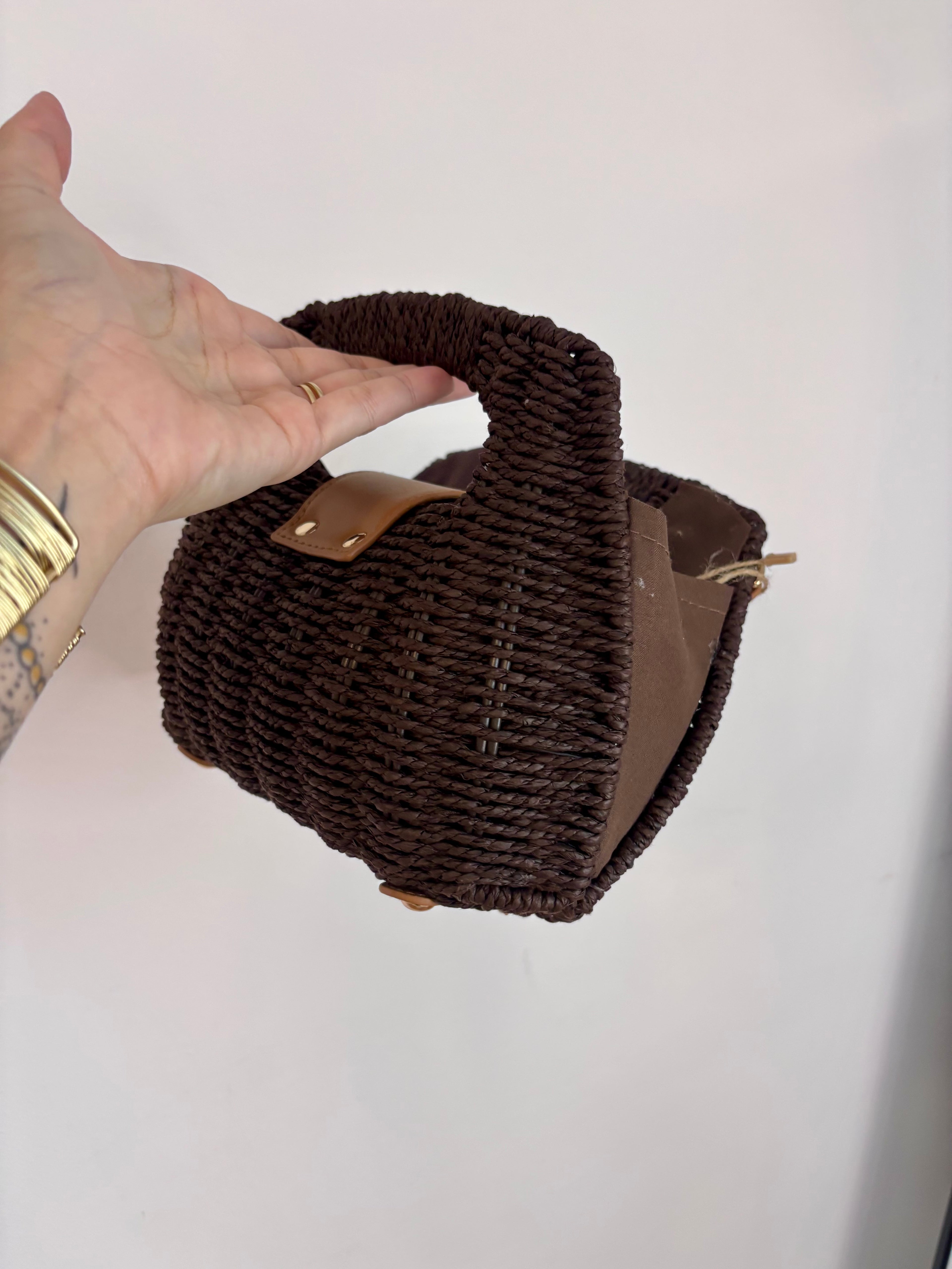 Bolso de mano trenzado